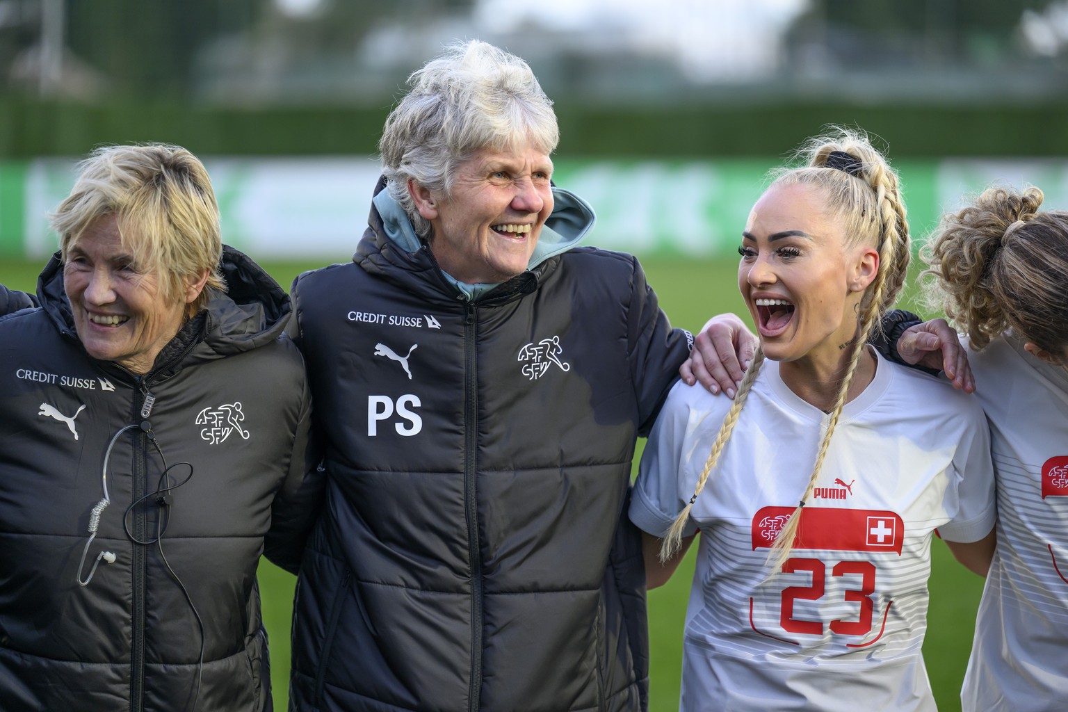 Switzerland&#039;s assistant coach Lilie Persson, left, Switzerland&#039;s head coach Pia Sundhage, centre, and Switzerland&#039;s Alisha Lehmann, right, celebrate their victory after defeating the te ...