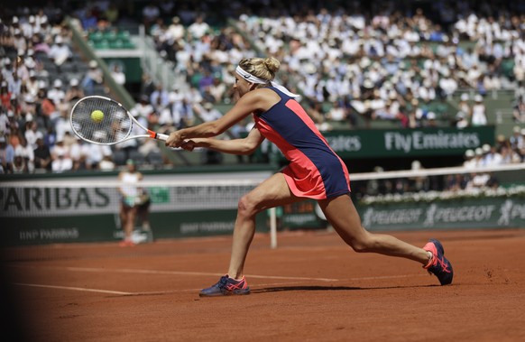 Timea Bacsinszky of Switzerland plays a shot against Latvia&#039;s Jelena Ostapenko during their semifinal match of the French Open tennis tournament at the Roland Garros stadium, in Paris, France. Th ...