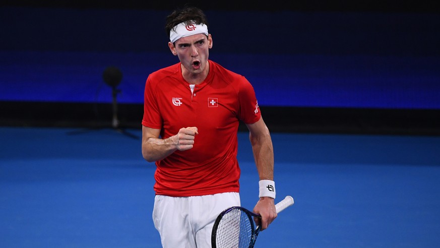 epa10381344 Marc-Andrea Huesler of Switzerland reacts during the 2023 United Cup tennis match between Switzerland and Kazakhstan at Pat Rafter Arena in Brisbane, Australia, 29 December 2022. EPA/JONO  ...