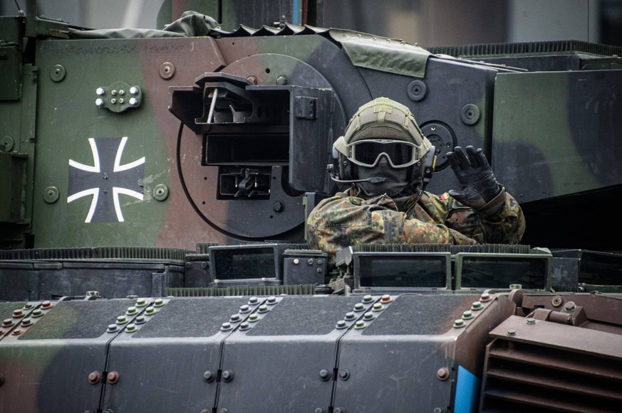 A military parade in honor of Armed Forces Day in Vilnius, Lithuania - 25 Nov 2023 German soldier participates in a military parade during Armed Forces Day in Vilnius. Armed Forces Day honours the res ...