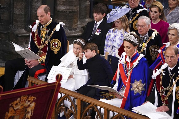 From left, 1st row, Britain&#039;s Prince William, Princess Charlotte, Prince Louis, Kate, Princess of Wales and the Prince Edward Duke of Edinburgh at the coronation ceremony of King Charles III in W ...