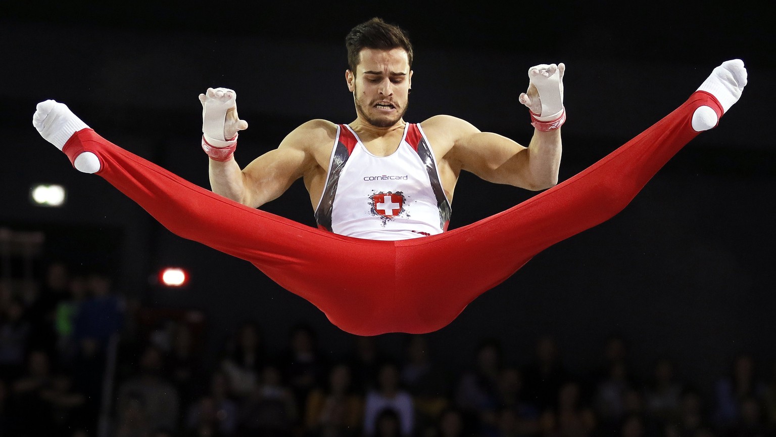 epa05923531 Winner Pablo Braegger of Switzerland performs on the high bar during 2017 Artistic Gymnastics European Championships, at the Polivalenta Sports Hall in Cluj-Napoca, Romania, 23 April 2017. ...