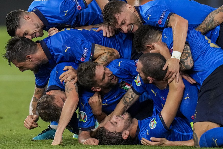 Italian players celebrate their second goal during the Euro 2020 soccer championship group A match between Italy and Switzerland at the Olympic stadium in Rome, Italy, Wednesday, June 16, 2021. (AP Ph ...