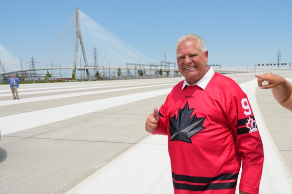 Doug Ford, Premier of Ontario, gives a thumbs up after a Canadian celebration for the opening of Gordie Howe International bridge connecting Detroit and Windsor, Ontario Friday, July 24, 2026, in Wind ...