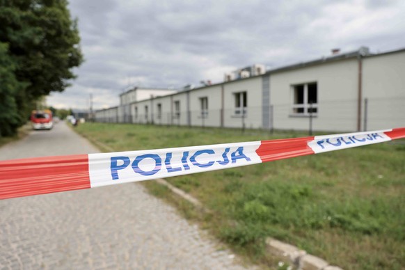 epa13202633 Police investigate the cause of a fire at the WB Group plant in Skarzysko-Kamienna, Poland, 31 August 2026. The fire broke out at the plant producing unmanned aerial vehicles on the night  ...
