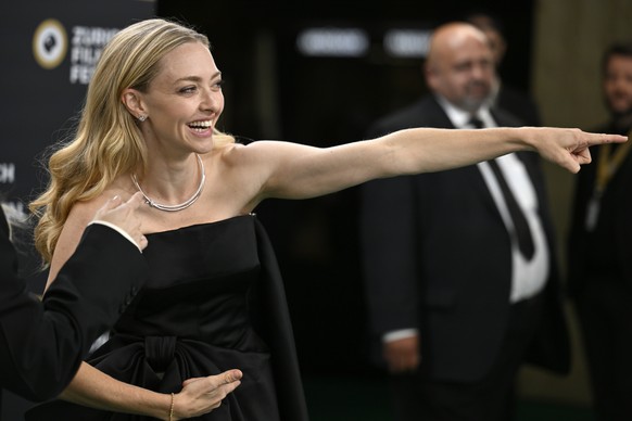 US actress Amanda Seyfried on the green carpet during the 21th annual Zurich Film Festival in Zurich, Switzerland, on Friday, October 3, 2025. (KEYSTONE/Walter Bieri)