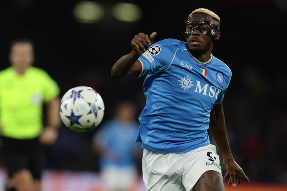 SSC Napoli s Nigerian forward Victor Osimhen controls the ball during the Uefa champions league match between SSC Napoli vs Braga at the Diego Armando Maradona Stadium in Naples, southern Italy, on De ...