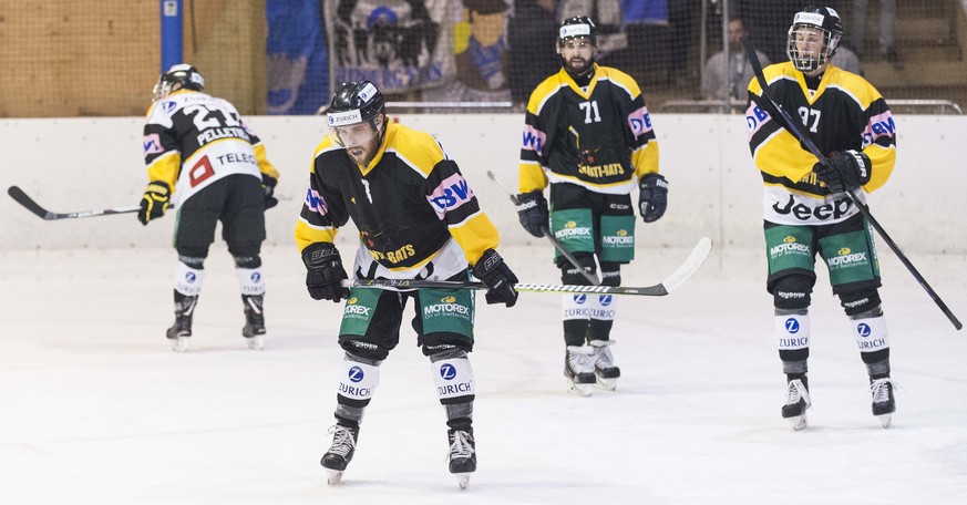 The players of Saint-Imier are disappointed during the 16th final game of the Swiss ice hockey Cup between HC Saint-Imier and HC Fribourg-Gotteron in the arena of Erguel in Saint-Imier, Switzerland, W ...