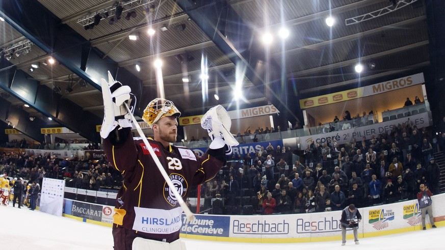 Geneve-Servette&#039;s goaltender Robert Mayer celebrates his victory after beating Biel, during a National League regular season game of the Swiss Championship between Geneve-Servette HC and EHC Biel ...