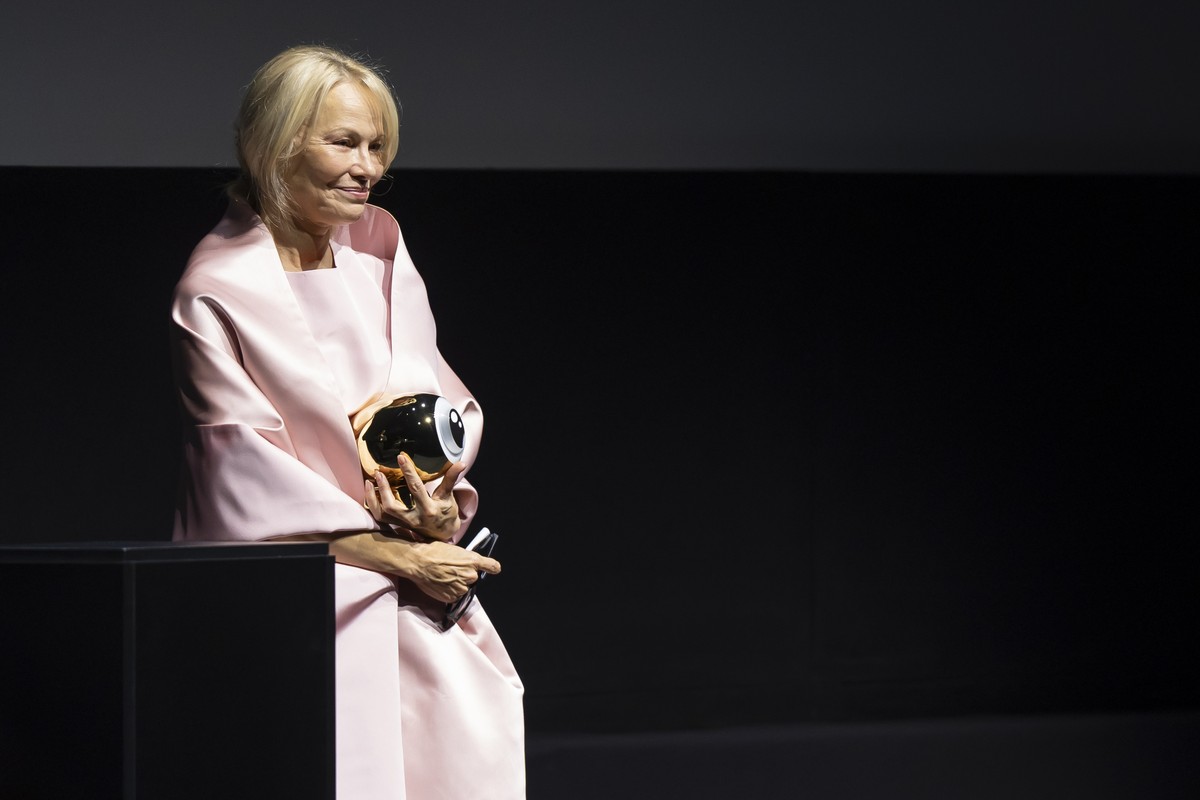 epa11642610 Canadian-American actress Pamela Anderson receives the Golden Eye Award before the screening of her movie 'The Last Showgirl' at the 20th Zurich Film Festival (ZFF), in Zurich, S ...