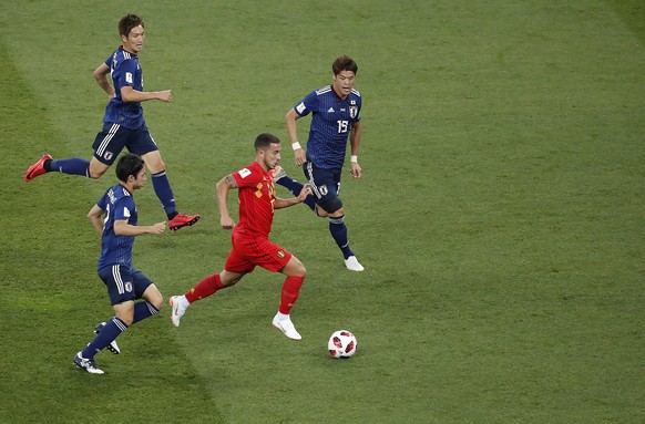 epa06859028 Eden Hazard of Belgium (2R) is followed by Japanese players in action the FIFA World Cup 2018 round of 16 soccer match between Belgium and Japan in Rostov-On-Don, Russia, 02 July 2018.

 ...