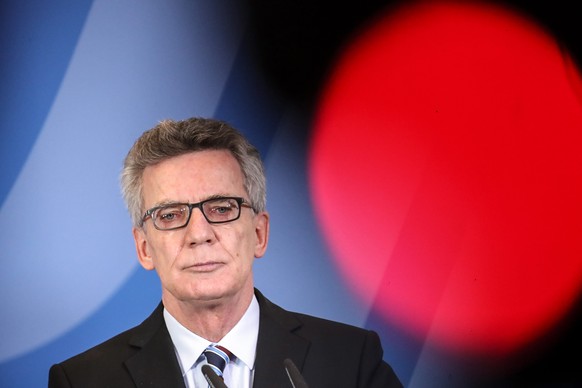 epa05686607 German Interior Minister Thomas de Maiziere attends a press conference at the Interior Ministry in Berlin, Germany, 23 December 2016. De Maiziere delivered a statement on the death of Anis ...