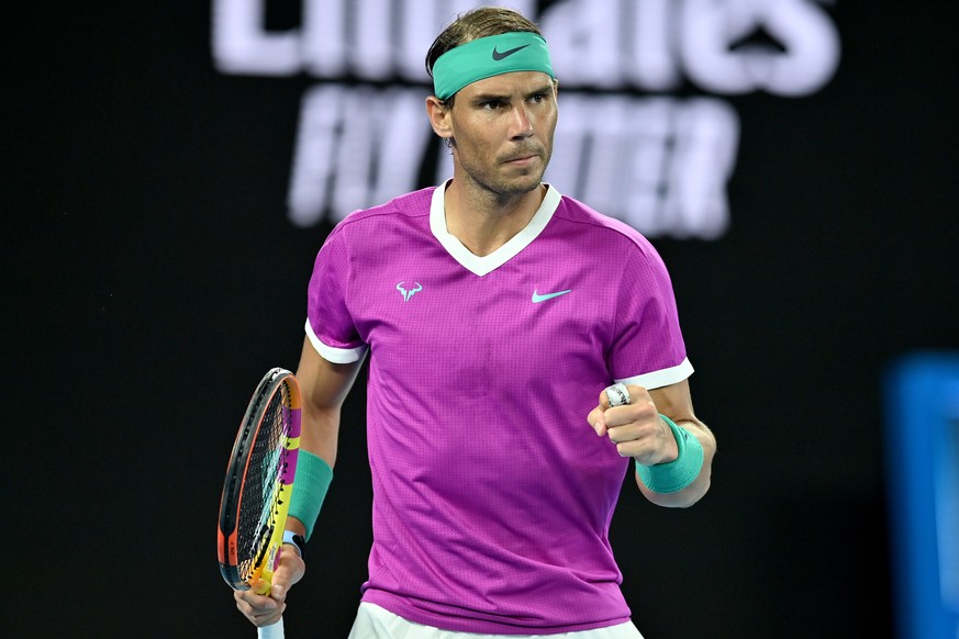 epa09713706 Rafael Nadal of Spain scores a winner against Matteo Berrettini of Italy in their semi final match at the Australian Open Grand Slam tennis tournament at Melbourne Park, in Melbourne, Aust ...