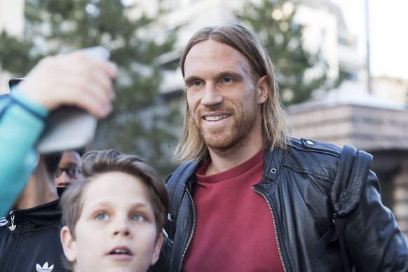 Michael Lang, player of the Swiss soccer national team, poses for a photograph during his arrival at the Royal Hotel Savoy, in Lausanne, Switzerland, Monday, March 20, 2017. Switzerland is scheduled t ...