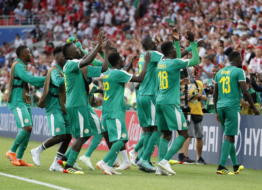 epa06821876 Senegal&#039;s player celebrate after winning the FIFA World Cup 2018 group H preliminary round soccer match between Poland and Senegal in Moscow, Russia, 19 June 2018.

(RESTRICTIONS AP ...