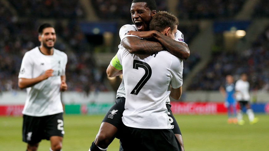 epa06146339 Liverpool&#039;s James Milner (R) celebrates scoring the second goal with Liverpool&#039;s Georginio Wijnaldum (L) UEFA Champions League play off round first leg match between TSG 1899 Hof ...