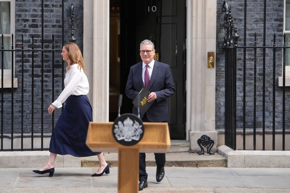 Britain's Prime Minister Keir Starmer and wife Victoria step out to speak to the media outside 10 Downing Street in London, Monday, June 22, 2026.(AP Photo/Kin Cheung)
Britain Politics