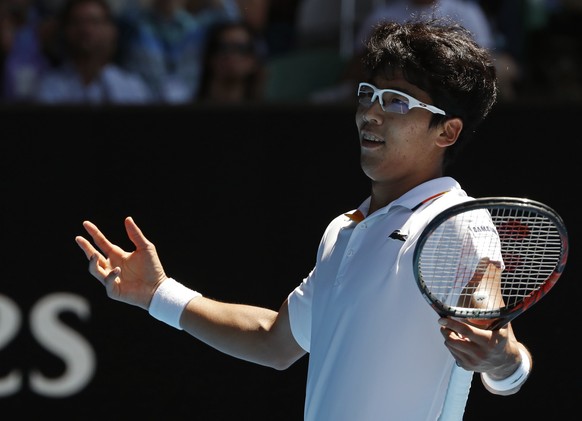 South Korea&#039;s Chung Hyeon reacts after winning the second set against United States&#039; Tennys Sandgren during their quarterfinal at the Australian Open tennis championships in Melbourne, Austr ...