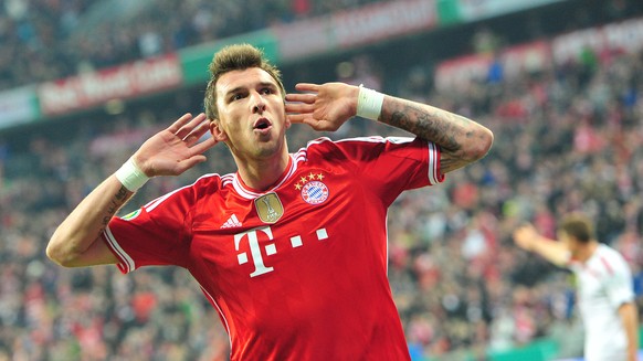 Munich&#039;s Mario Mandzukic of Croatia celebrates after scoring during the German soccer cup, DFB Pokal, semifinal soccer match between FC Bayern Munich and FC Kaiserslautern in the Allianz Arena in ...