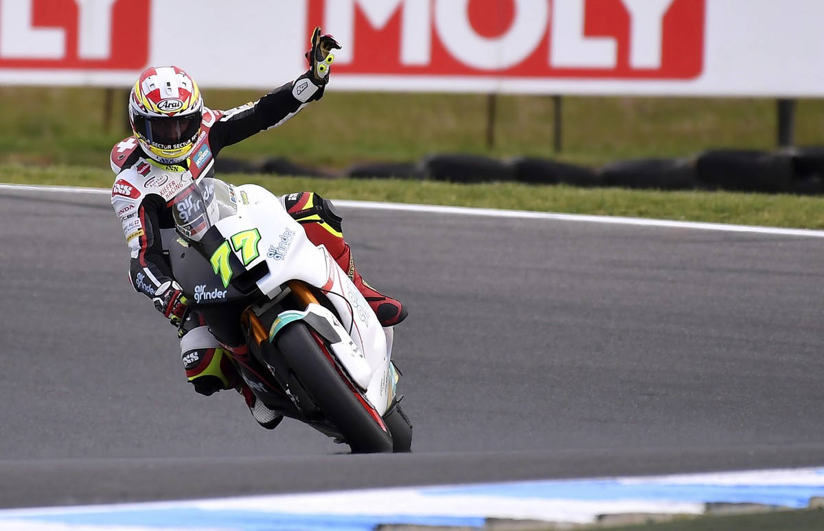 Switzerland's Moto2 rider Dominique Aegerter gestures as he steers his Suter during qualifying for the Australian Motorcycle Grand Prix at Phillip Island near Melbourne, Australia, Saturday, Oct. ...