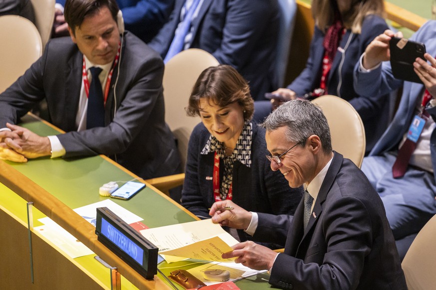 President of the Confederation and Minister of Foreign Affairs Ignazio Cassis, right, fills out the ballot next to Pascale Baeriswyl, Ambassador and Permanent Representative of Switzerland to the Unit ...