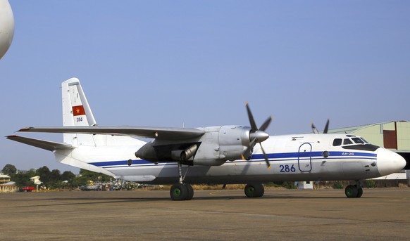 FILE- In this file photo dated Sunday, 9 March 2014, a Vietnamese air force aircraft AN-26 is seen at a base in Ho Chi Minh City, Vietnam. Russia&#039;s Defense Ministry says an AN-26 Russian military ...