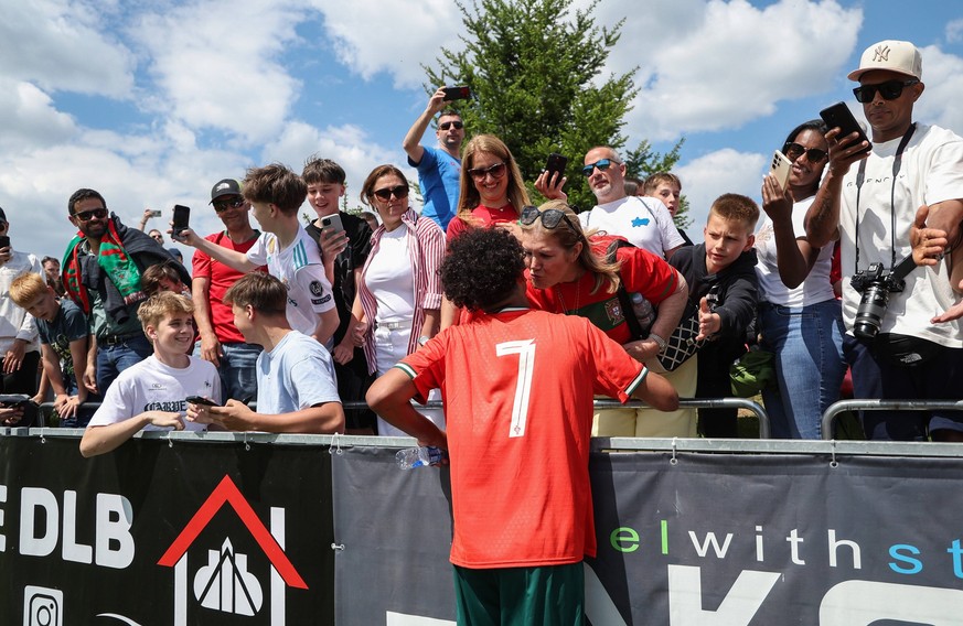Cristiano Junior plays against Japan in the U-15 league in Croatia Cristiano Ronaldo Jr. with his grandmother Dolores Aveiro after the U-15 league match against Japan at the international football tou ...