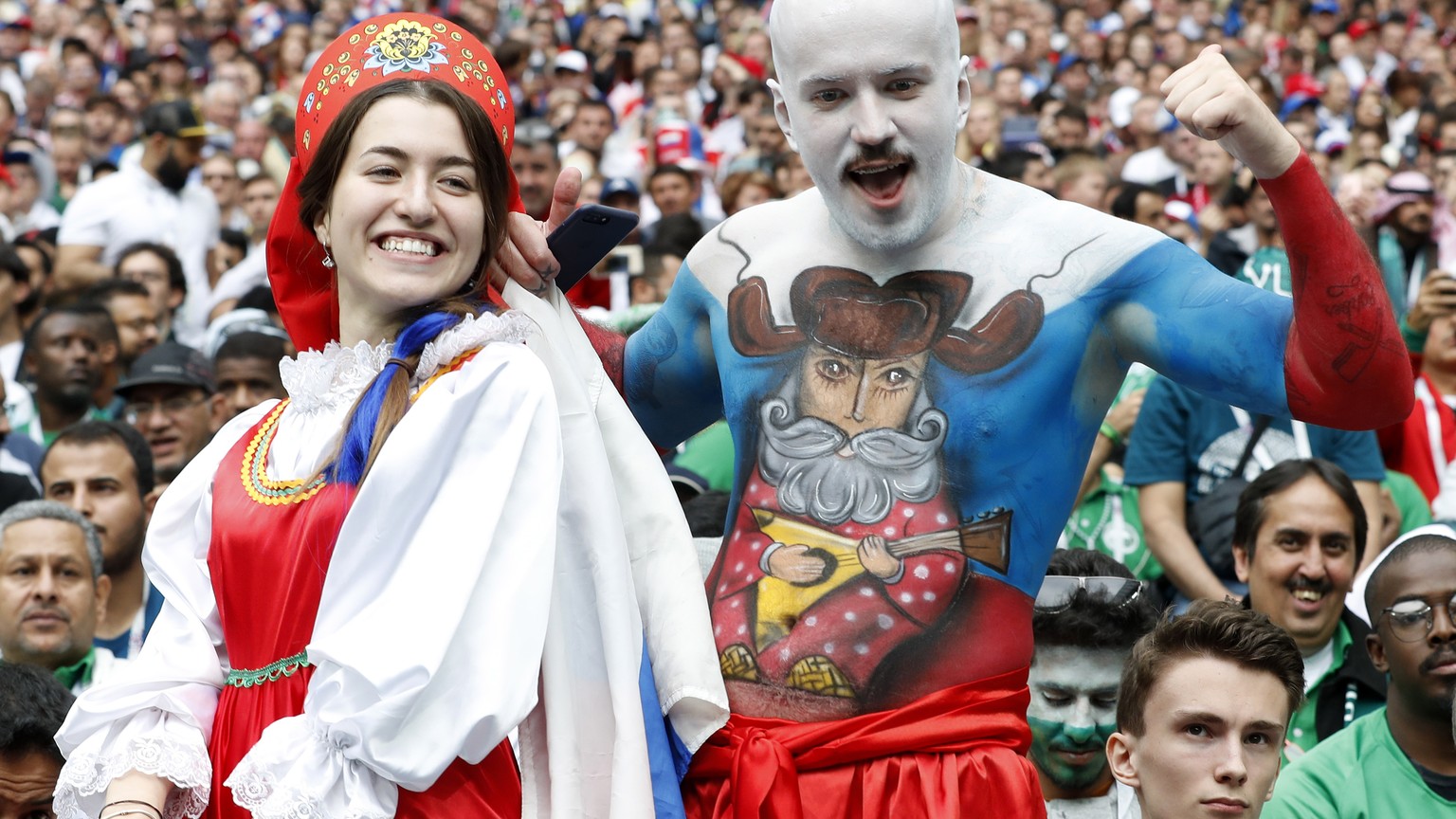 epa06807309 Russian fans pictured before the start of the FIFA World Cup 2018 group A preliminary round soccer match between Russia and Saudi Arabia in Moscow, Russia, 14 June 2018.

(RESTRICTIONS A ...