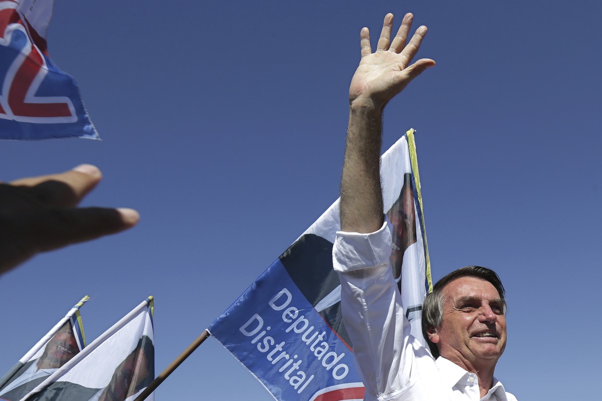 National Social Liberal Party presidential candidate Jair Bolsonaro greets supporters during a campaign rally in Brasilia's Ceilandia neighborhood, Brazil, Wednesday, Sept. 5, 2018. Brazilians go ...