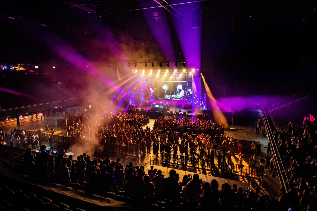 epa09056717 Visitors gather for a dance event in Ziggo Dome in Amsterdam, The Netherlands, 06 March 2021. During a series of events, Fieldlab Events Co. investigates how large groups of people can com ...