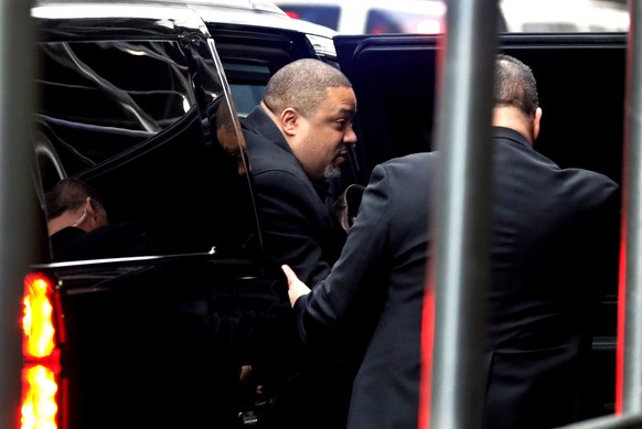 epa10540835 New York County District Attorney Alvin Bragg (C) arrives at New York Criminal Court in advance of a potential Indictment of former US president Donald J. Trump in New York, New York, USA, ...