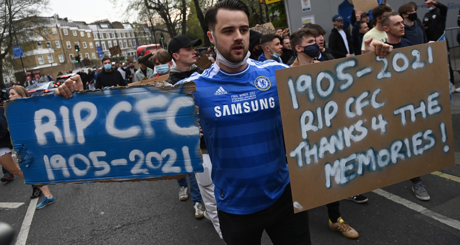 epa09147789 Chelsea fans stage a demonstration against the European Super league before the English Premier League soccer match between Chelsea FC and Brighton &amp; Hove Albion FC in London, Britain, ...