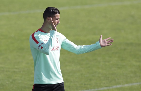 Portugal&#039;s Cristiano Ronaldo gesturesduring a training session in Oeiras, outside Lisbon, Monday, Oct. 9, 2017. Portugal will face Switzerland in a World Cup Group B qualifying soccer match in Li ...