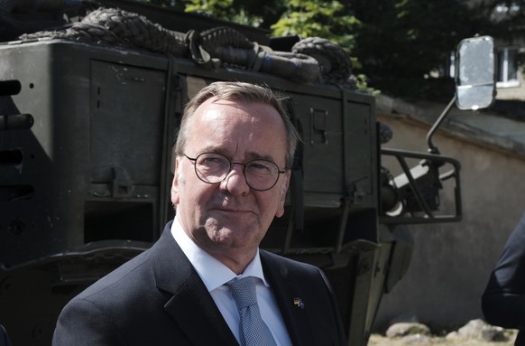 epa13074752 Germany's Defense Minister Boris Pistorius (C) speaks to the media during a military ceremony in the Estonian-Latvian border town of Valga/Valka, 30 June 2026. During the ceremony, th ...