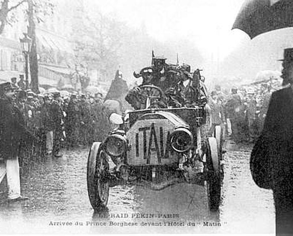 Peking to Paris Rally 1907: The victorious Itala arriving in Paris.

https://en.wikipedia.org/wiki/Peking_to_Paris