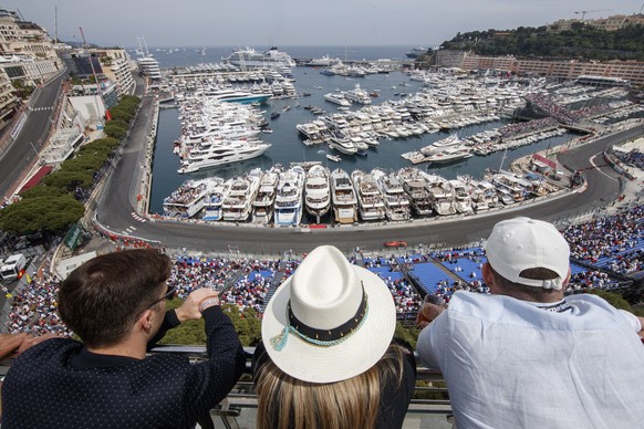 epa07599738 Formula One fans follow the qualifying session of the Formula One Grand Prix of Monaco at the Monte Carlo circuit in Monaco, 25 May 2019. The 2019 Formula One Grand Prix of Monaco will tak ...