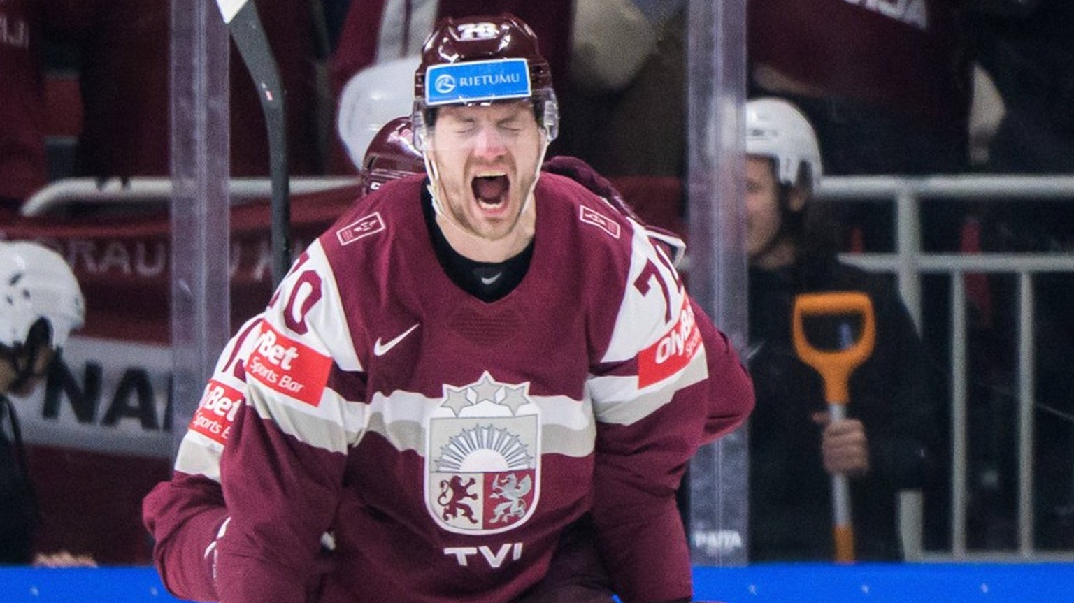 230525 Miks Indrasis of Latvia celebrates after scoring 1-2 during the 2023 IIHF Ice hockey, Eishockey World Championship, WM, Weltmeisterschaft quarterfinal game between Sweden and Latvia on May 25,  ...