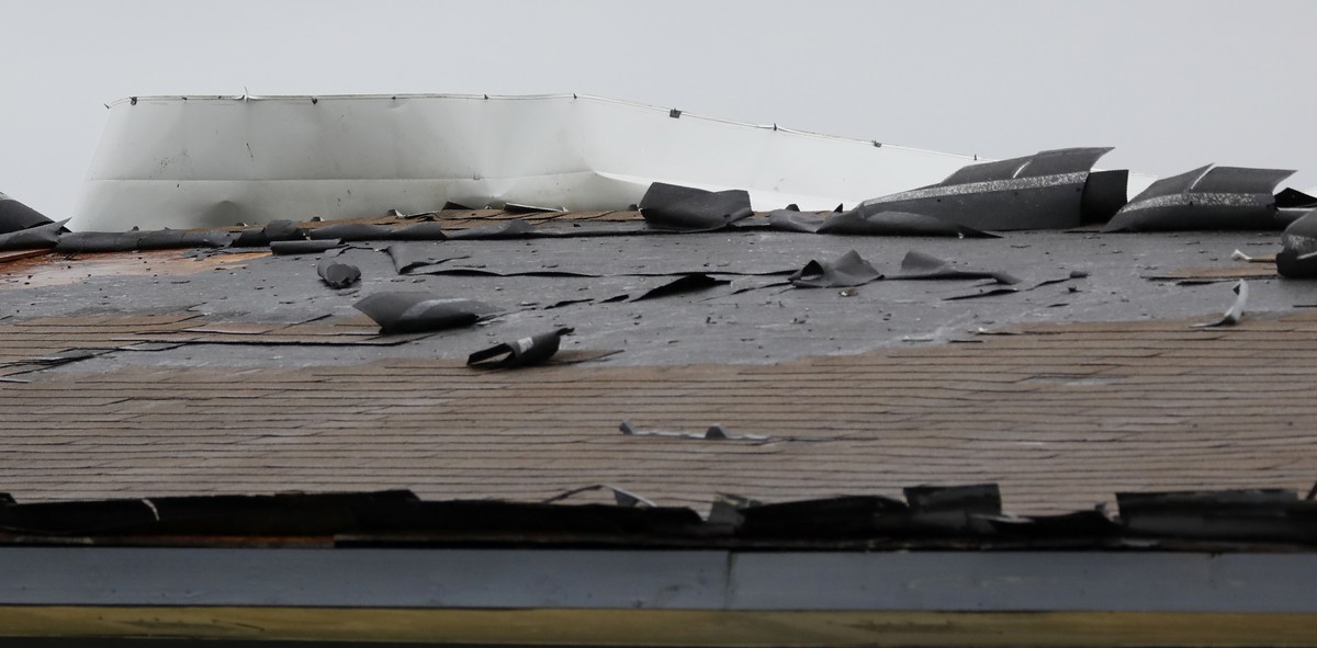 The roof of the Solar's Apartments in Morgan City, La., is damaged by the winds of Tropical Storm Barry, Saturday, July 13, 2019. Nearly all businesses in Morgan City were shuttered as coastal Lo ...