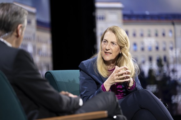 epa13018067 Swiss State Secretary for Economic Affairs Helene Budliger Artieda (R) speaks with Swiss moderator Urs Gredig (L) during the Swiss Economic Forum SEF in Interlaken, Switzerland, 05 June 20 ...