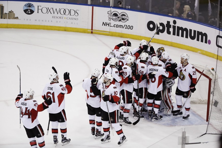 The Ottawa Senators celebrate after Game 6 of an NHL hockey Stanley Cup second-round playoff series against the New York Rangers, Tuesday, May 9, 2017, in New York. The Senators won 4-2. (AP Photo/Fra ...