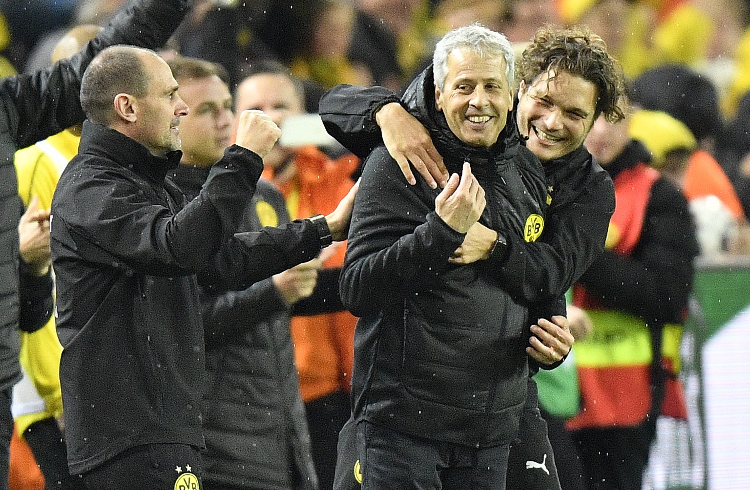 Dortmund coach Lucien Favre, celebrates with the bench after the German Bundesliga soccer match between Borussia Dortmund and Bayern Munich in Dortmund, Germany, Saturday, Nov. 10, 2018. Dortmund defe ...