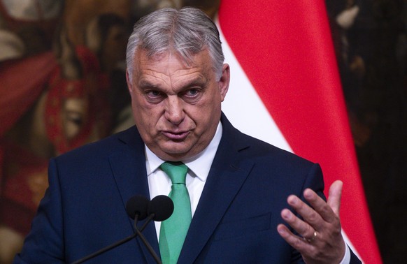 epa11434915 Hungarian Prime Minister Viktor Orban holds a joint press conference with the Italian prime minister after their meeting at the Chigi Palace in Rome, Italy, 24 June 2024. EPA/ANGELO CARCON ...