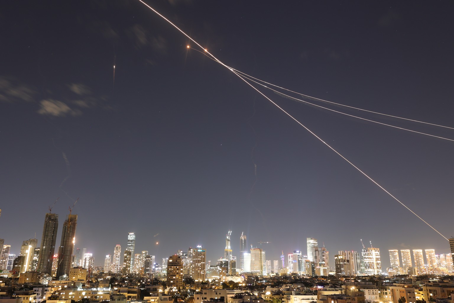 epa12785036 Iron Dome interception of a missile in the sky over Tel Aviv, Israel, 28 February 2026. The Israeli military reported on 28 February it deteced missiles launched from Iran following earlie ...