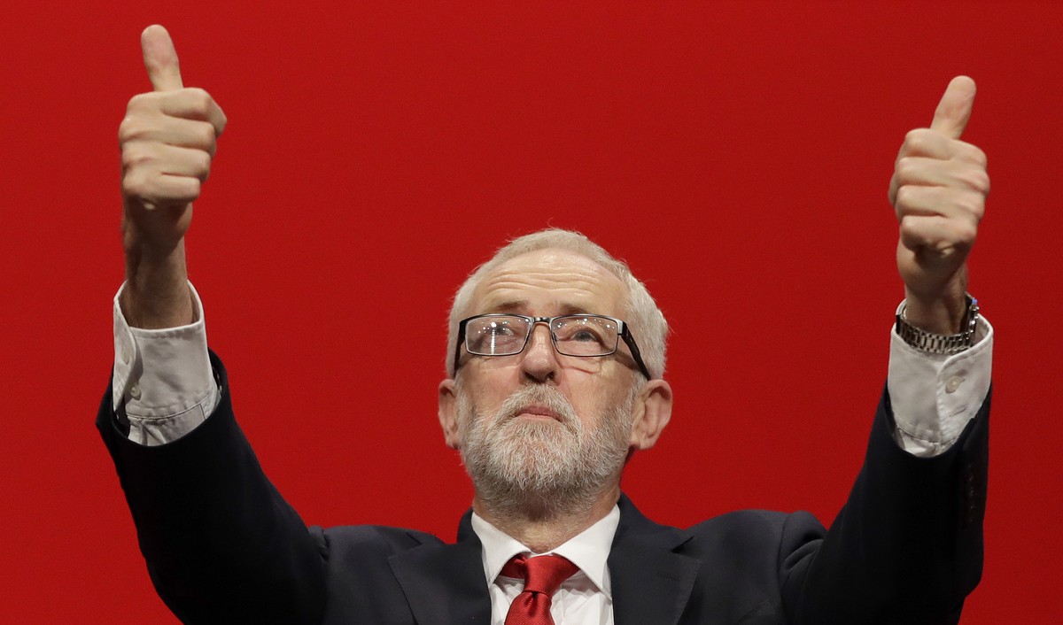 Jeremy Corbyn, leader of Britain's opposition Labour Party gives thumbs up after he addressed party members during the Labour Party Conference at the Brighton Centre in Brighton, England, Tuesday ...