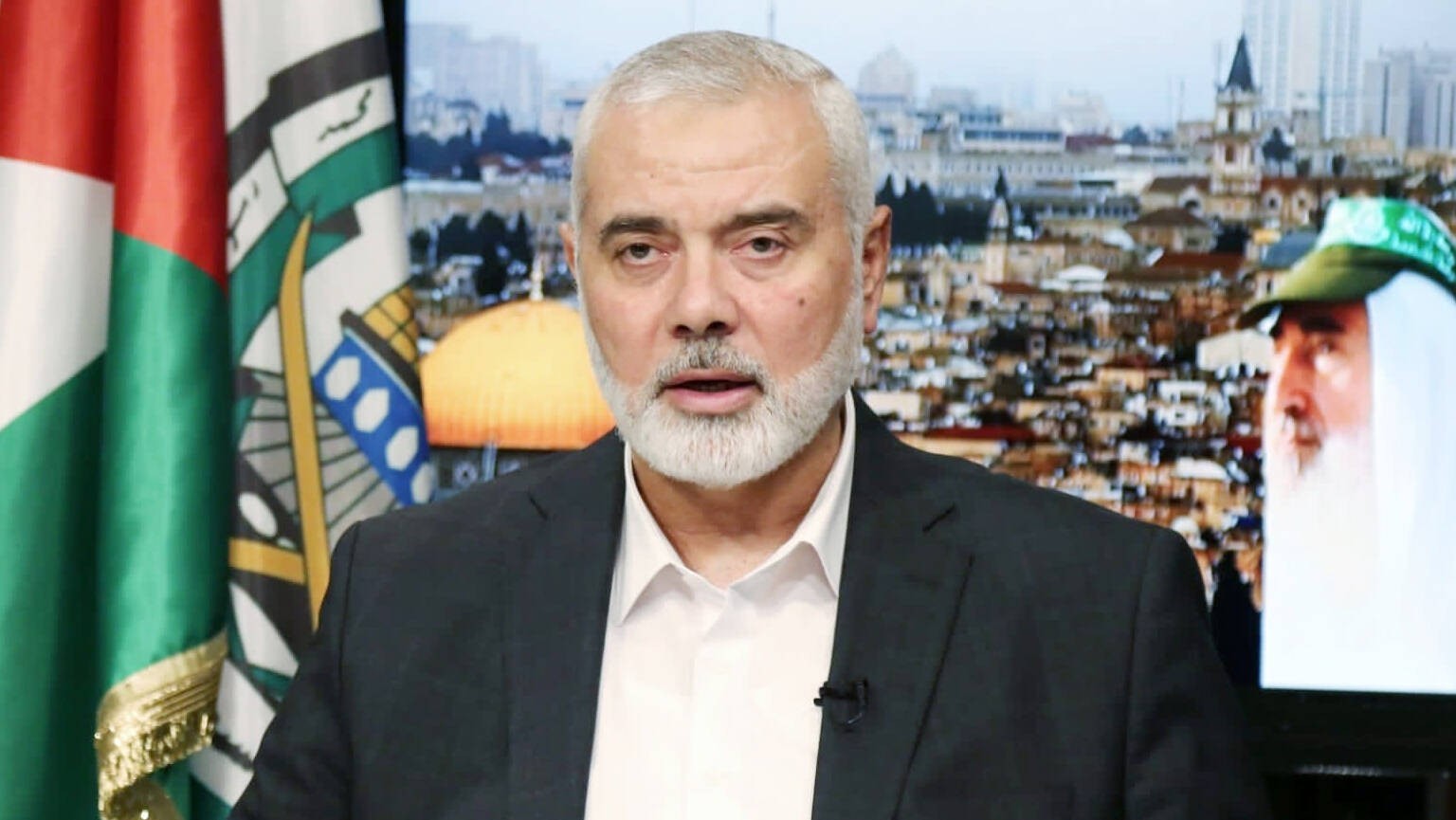 Katar, Hamas-Chef Ismail Haniyya Videoansprache in Doha December 14, 2021, Doha, Doha, Qatar: Head of the Hamas political bureau, Ismail Haniyeh speaks during a video statement marking the 34th annive ...