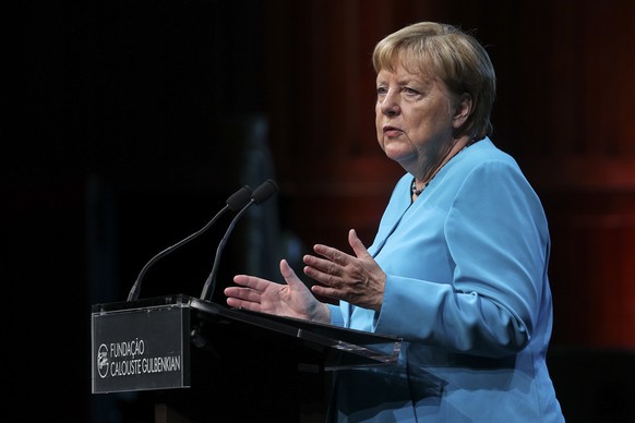 epa12227959 Former Germany Chancellor and President of the Jury of the Gulbenkian Prize for Humanity Angela Merkel (R) speaks at the award ceremony for the 2025 Gulbenkian Prize for Humanity in Lisbon ...