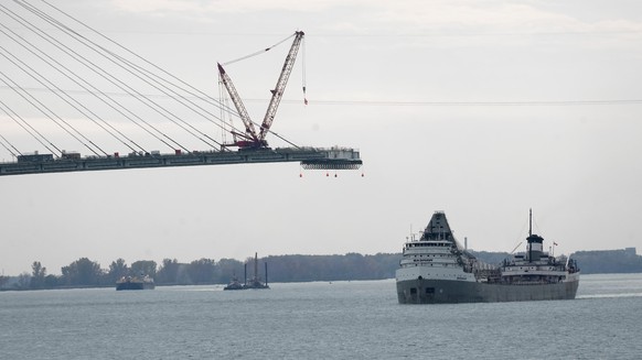 FILE - The Saginaw passes construction on the Gordie Howe International Bridge connecting on the Detroit River connecting Windsor, Ontario and Detroit, Oct. 25, 2023. (AP Photo/Paul Sancya, File)
Trum ...