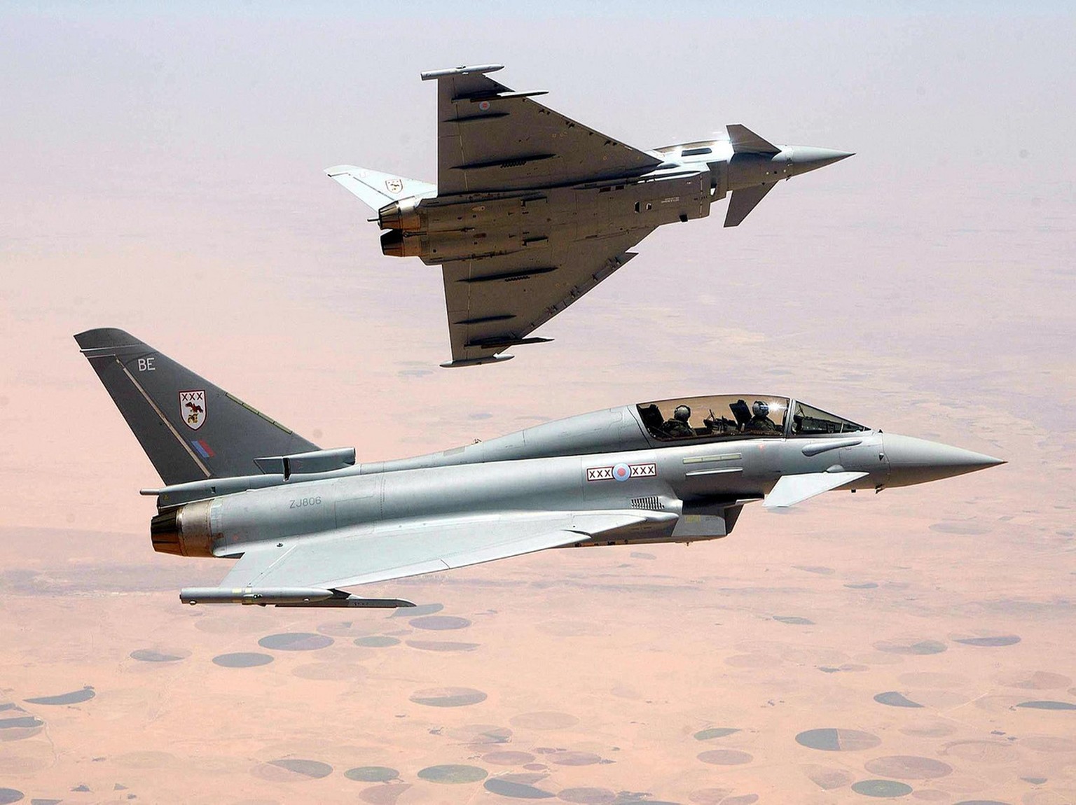 Two British Royal Air Force Typhoon aircraft of 29 Squadron are seen in this picture released Saturday July 3, 2004 by the RAF as they head for Singapore on Friday July 2 2004. Flying from England the ...