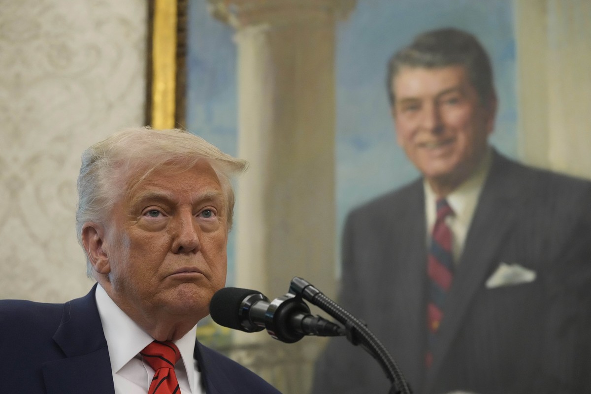 President Donald Trump speaks before Steve Witkoff is sworn as special envoy during a ceremony in the Oval Office of the White House, Tuesday, May 6, 2025, in Washington, with a portrait of former Pre ...