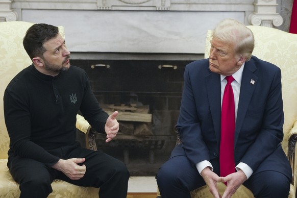 President Donald Trump, right, meets with Ukrainian President Volodymyr Zelenskyy in the Oval Office at the White House, Friday, Feb. 28, 2025, in Washington. (AP Photo/ Mystyslav Chernov)
Donald Trum ...